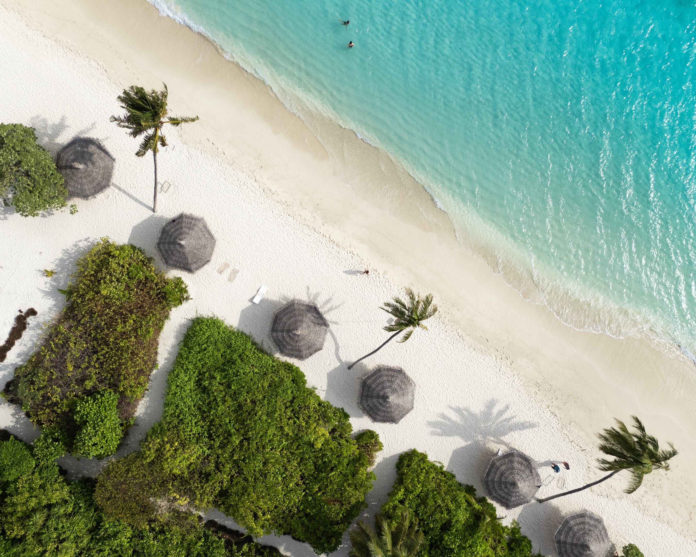 Aerial of Belena and the turquoise lagoon off Thoddoo